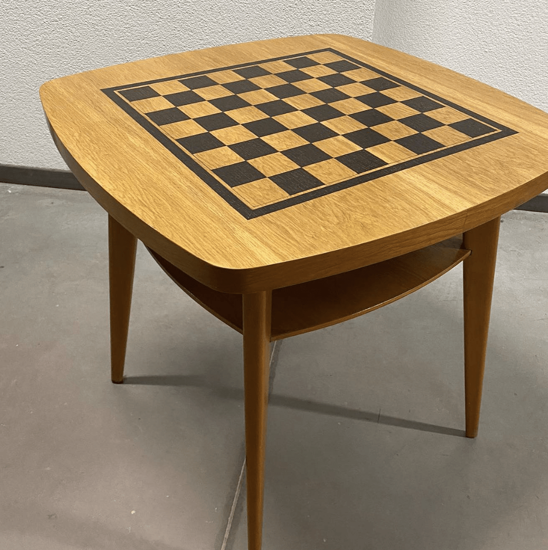 wood burnt chess board on table