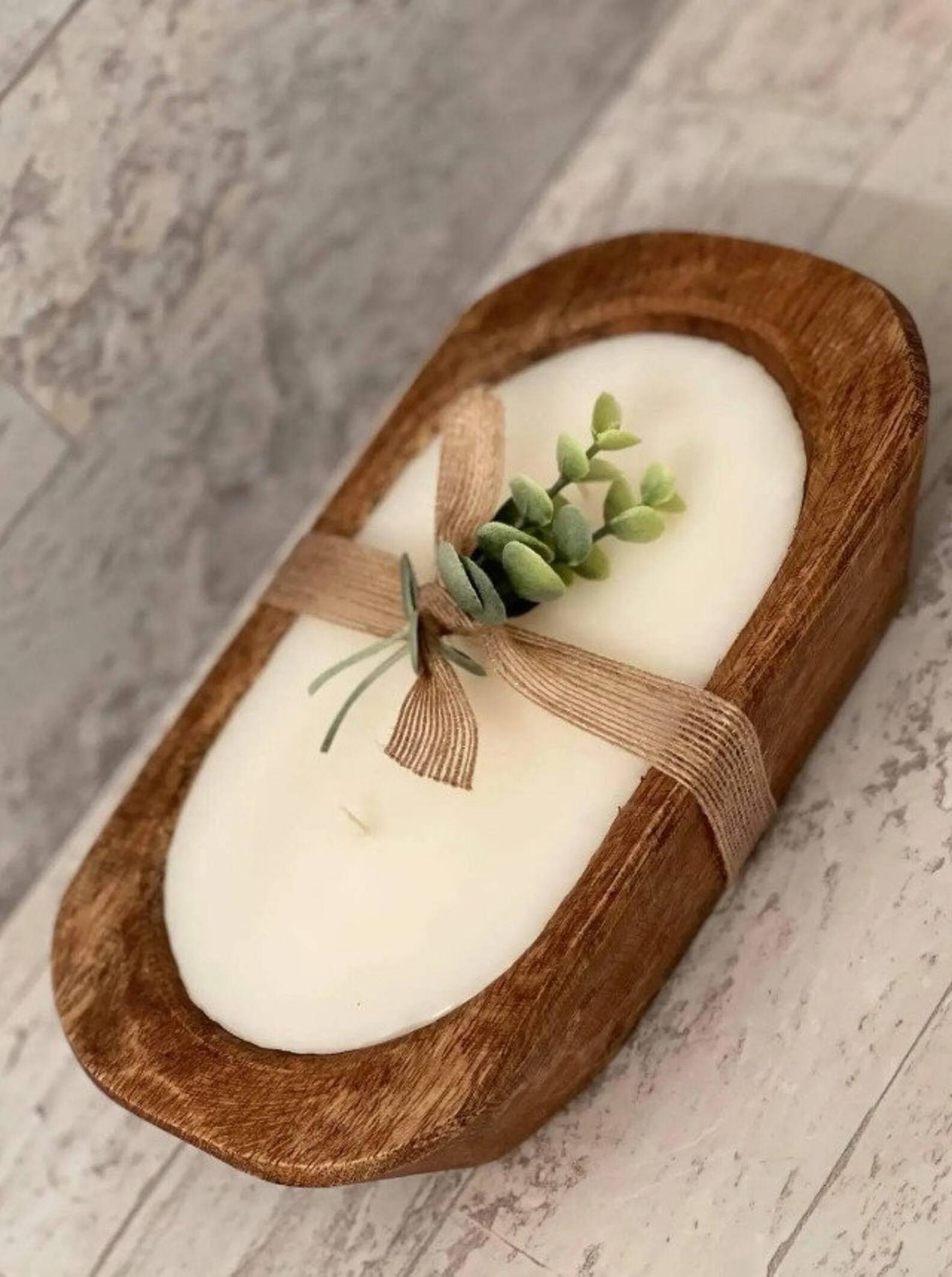 wood dough bowl candle with greenery