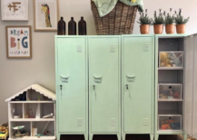 mint green child size lockers in a kids toy room with toys doll house