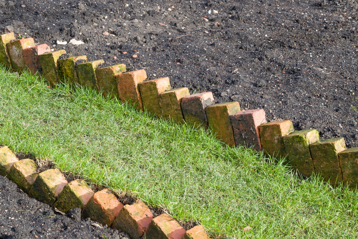 angled bricks garden edging close up