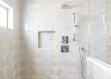 walk in shower in gold and gray wall tiles infinity drain polished nickel shower kit