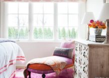 pink orange and purple theme bedroom with chaise lounge wood dresser roman blinds big window