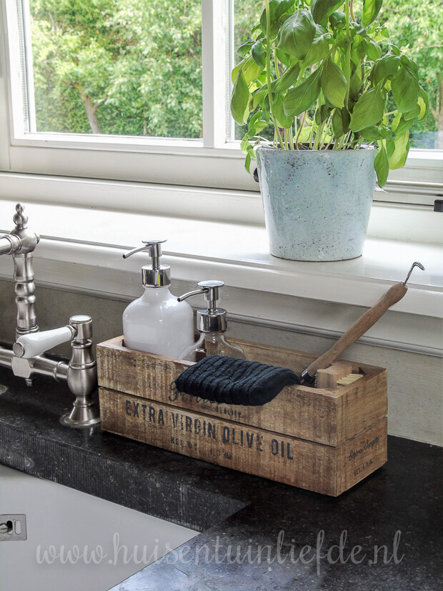 reclaimed wooden box for soaps beside sink
