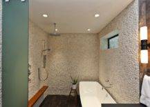 shower with stone tiles rain shower head, teak shower shelf, freestanding tub and porcelain floor tiles