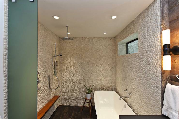 shower with stone tiles rain shower head, teak shower shelf, freestanding tub and porcelain floor tiles