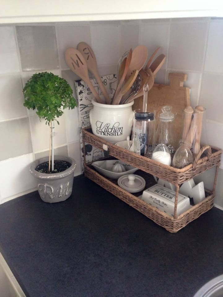 two tiered baskets in corner of kitchen countertops