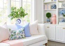 living room with pastel pink and blue colors bookshelf
