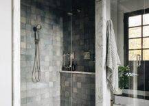 all dark grey grid tile walk in shower with chrome shower kit