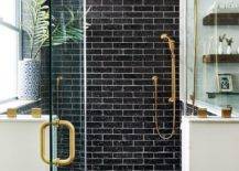 black subway tile with gold shower kit walk in with glass door