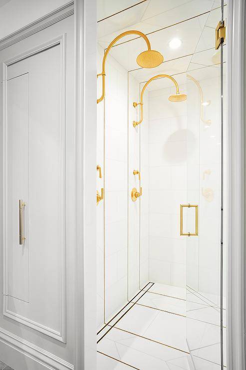 double his and her brass shower heads white tile walk in shower with glass door