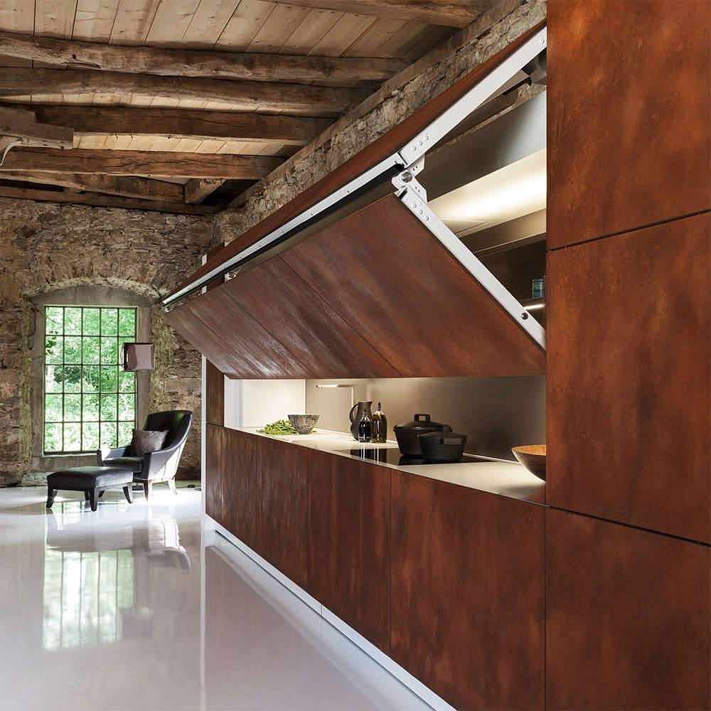 brown wood hidden kitchen