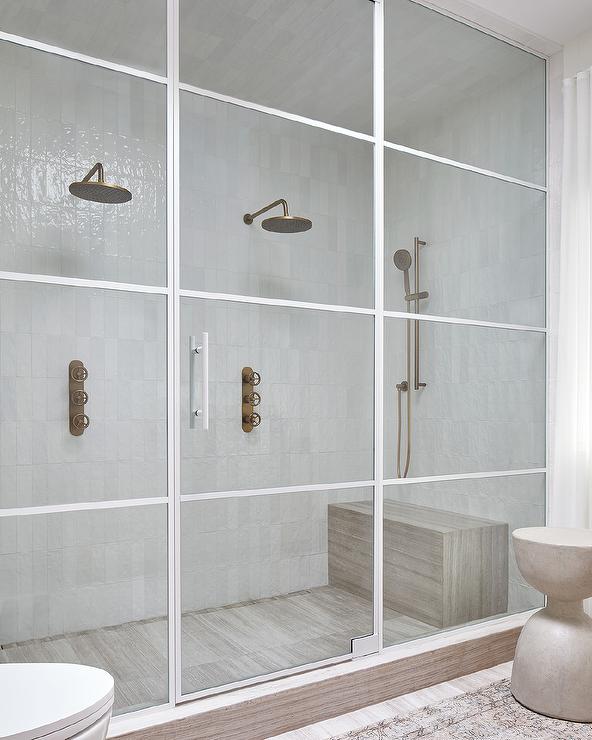 double rainfall shower head in walk in shower with glass white square frame door