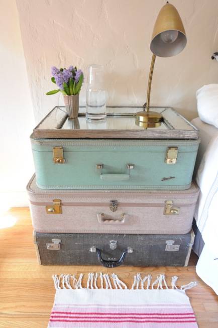 staked suitcase nightstand in pastel colors