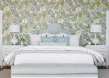 floral wallpaper blue and white queen bed with blue headboard nightstands and table lamps