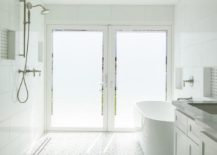 double frosted glass doors walk in shower with gray mosaic tile