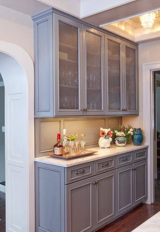 grey blue cabinets with wire mesh