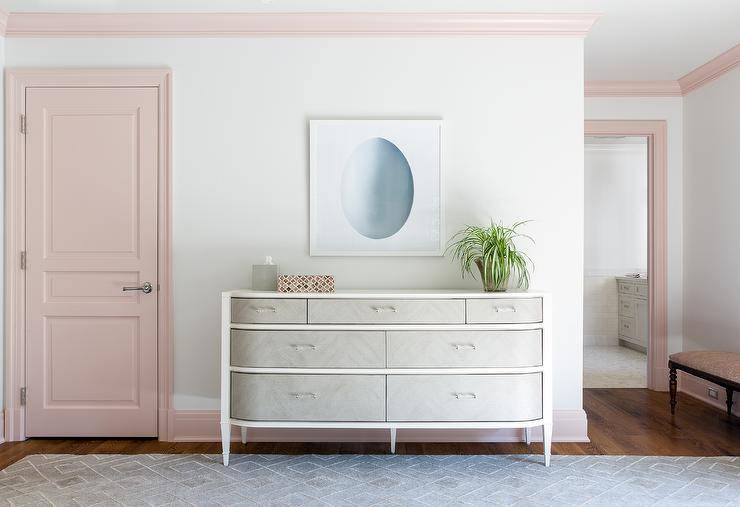pink painted trim white walls and pastel pink door