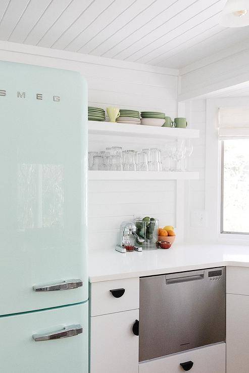 pastel blue smeg fridge in white kitchen