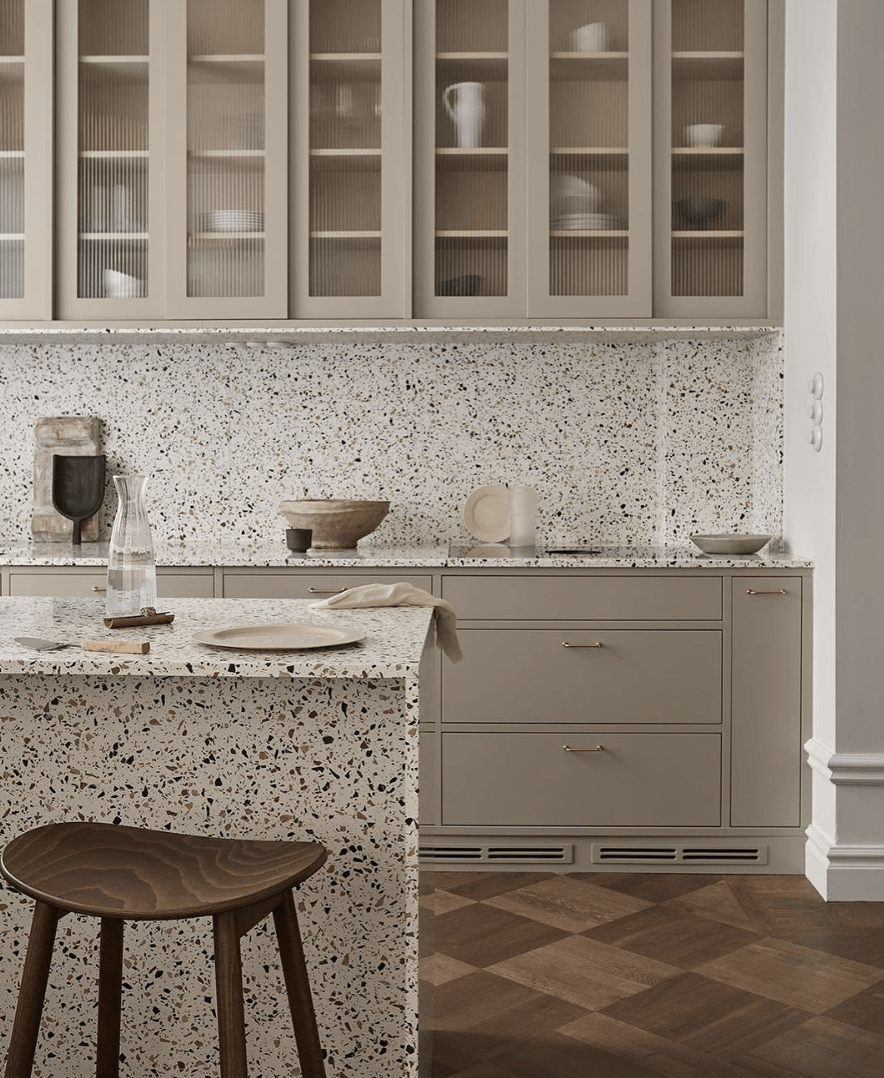 terrazzo kitchen with olive green cupboards