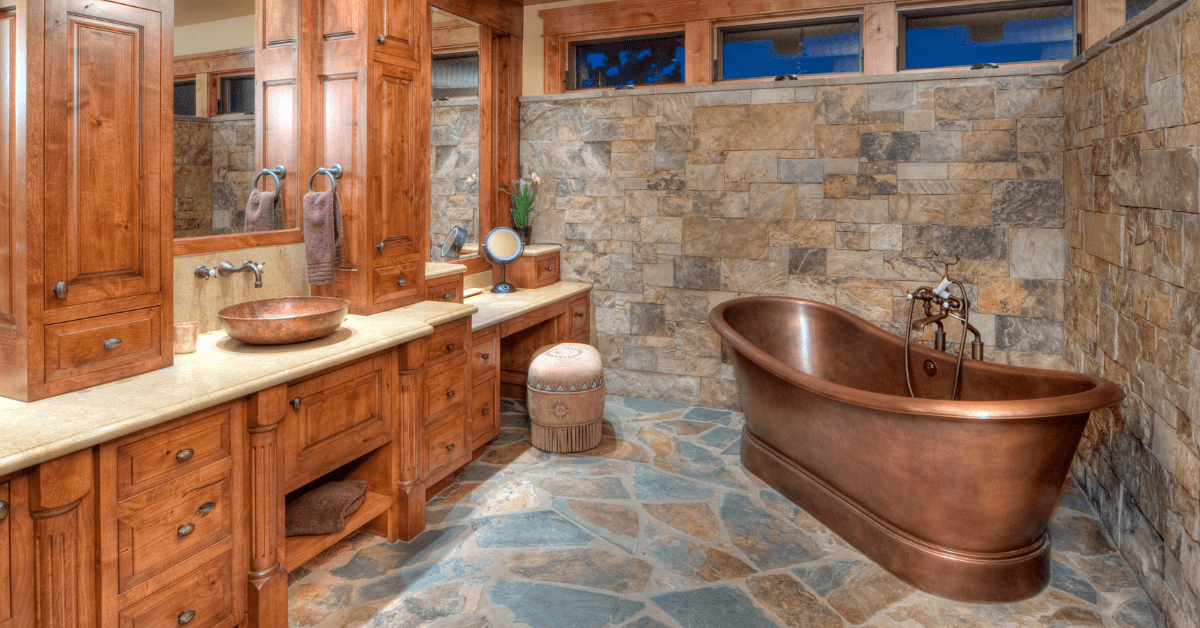 A master bathroom with copper tub.