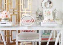 gold model framework screen divider for living room white table in front with french chair