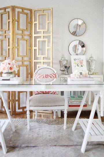 gold model framework screen divider for living room white table in front with french chair