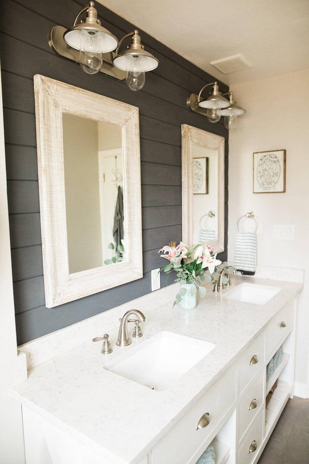 cottage style bathroom with navy shiplap farmhouse lights double vanity