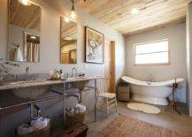 farmhouse style master bathroom with free standing tub rustic mat pedestal chrome his and her sinks with mirrors