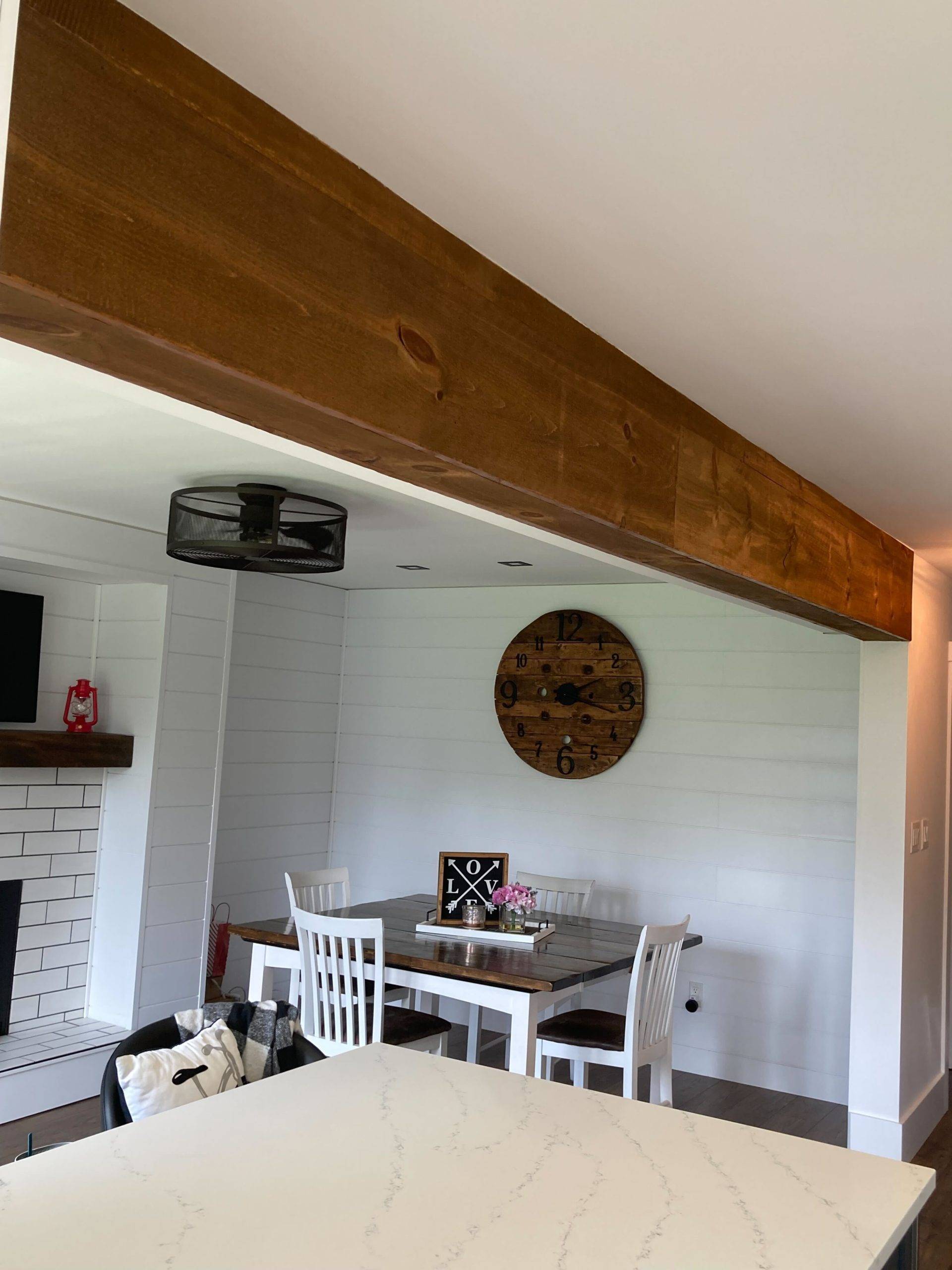 wooden ceiling beam over kitchen counter