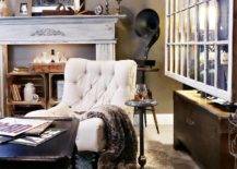rustic industrial styled basement with dark grey walls white tufted sitting chair faux fur throw salvaged window divider
