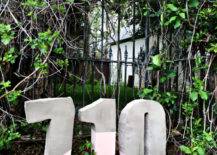 giant cement house numbers painted and in garden