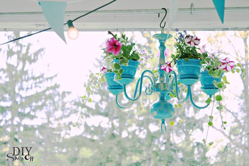 blue painted chandelier DIY planter with flowers