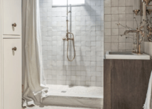 elegant white basement bathroom walk in shower with vanity