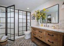 farmhouse bathroom with glass black frame doors wood vanity with subway tile black frame mirror