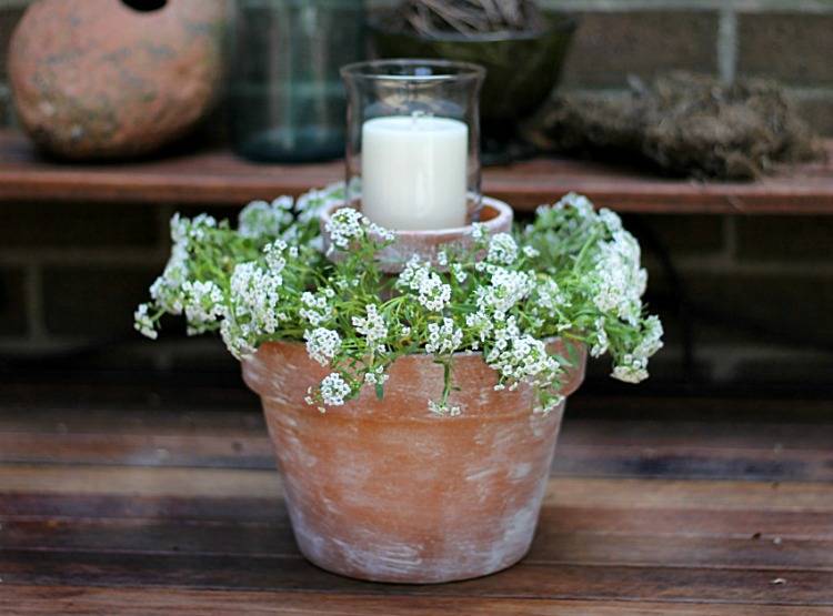 flower pot centerpiece for patio with hurricane and candle