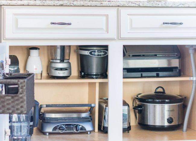 lower storage for appliances cream cupboards