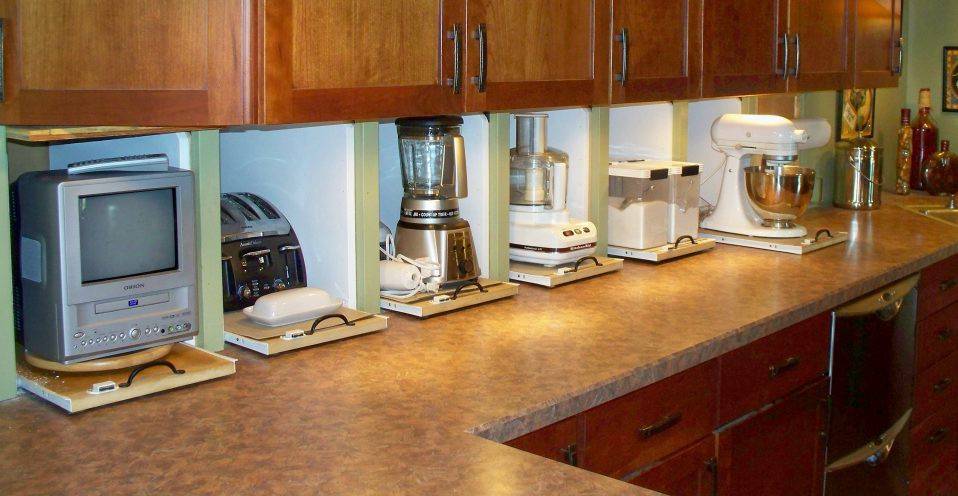 appliance garages in kitchen brown cabinetry