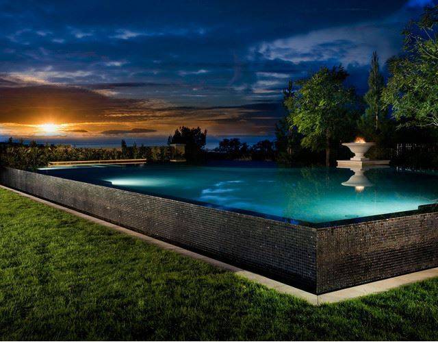 rectangle metal frame above ground pool with water fountain
