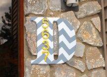 monogram letter d with numbers on side of house