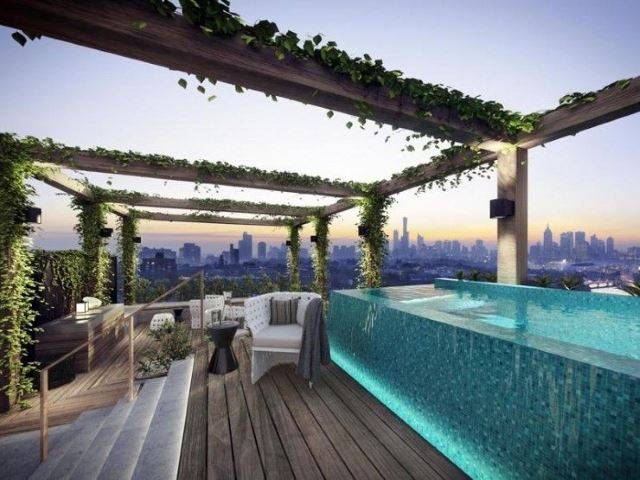frameless above ground pool on roof top deck