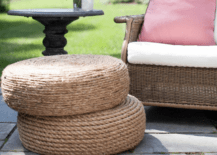close up of two rope ottomans outside stacked on top of one another