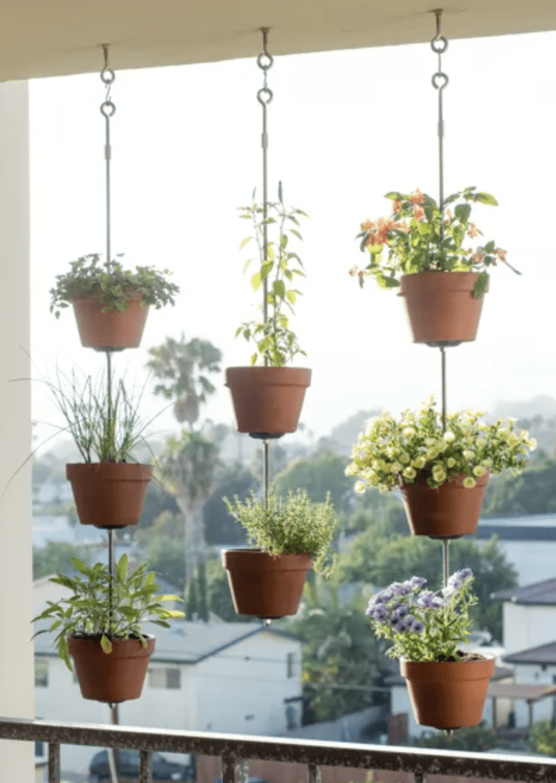 vertical clay pots hanging garden on balcony