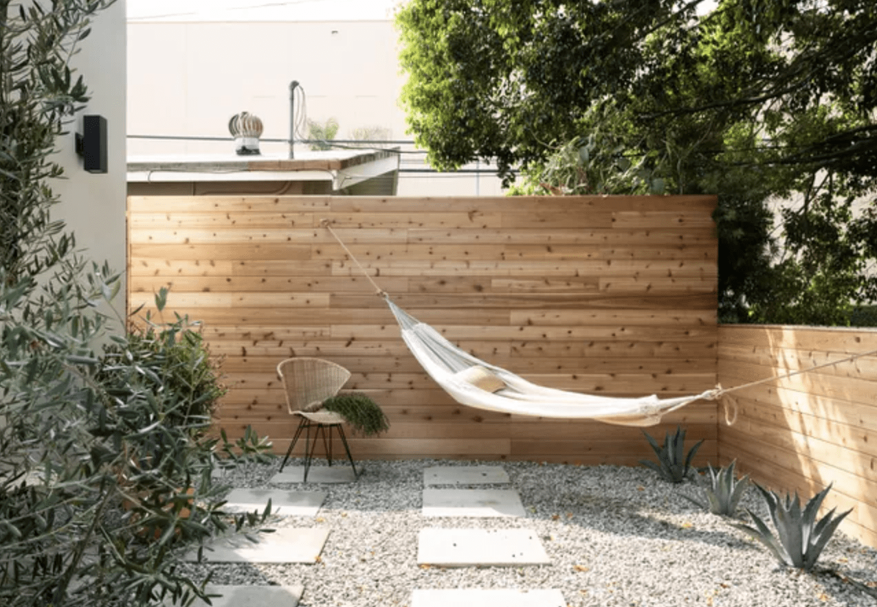 hanging hammock along wood slat wall