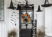 an entryway decorated with witch hats