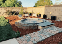 above ground pool surrounded by brick pavers