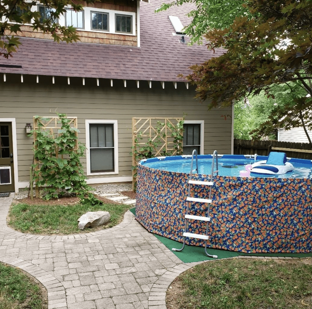 floral pool skirt in backyard with above ground pool