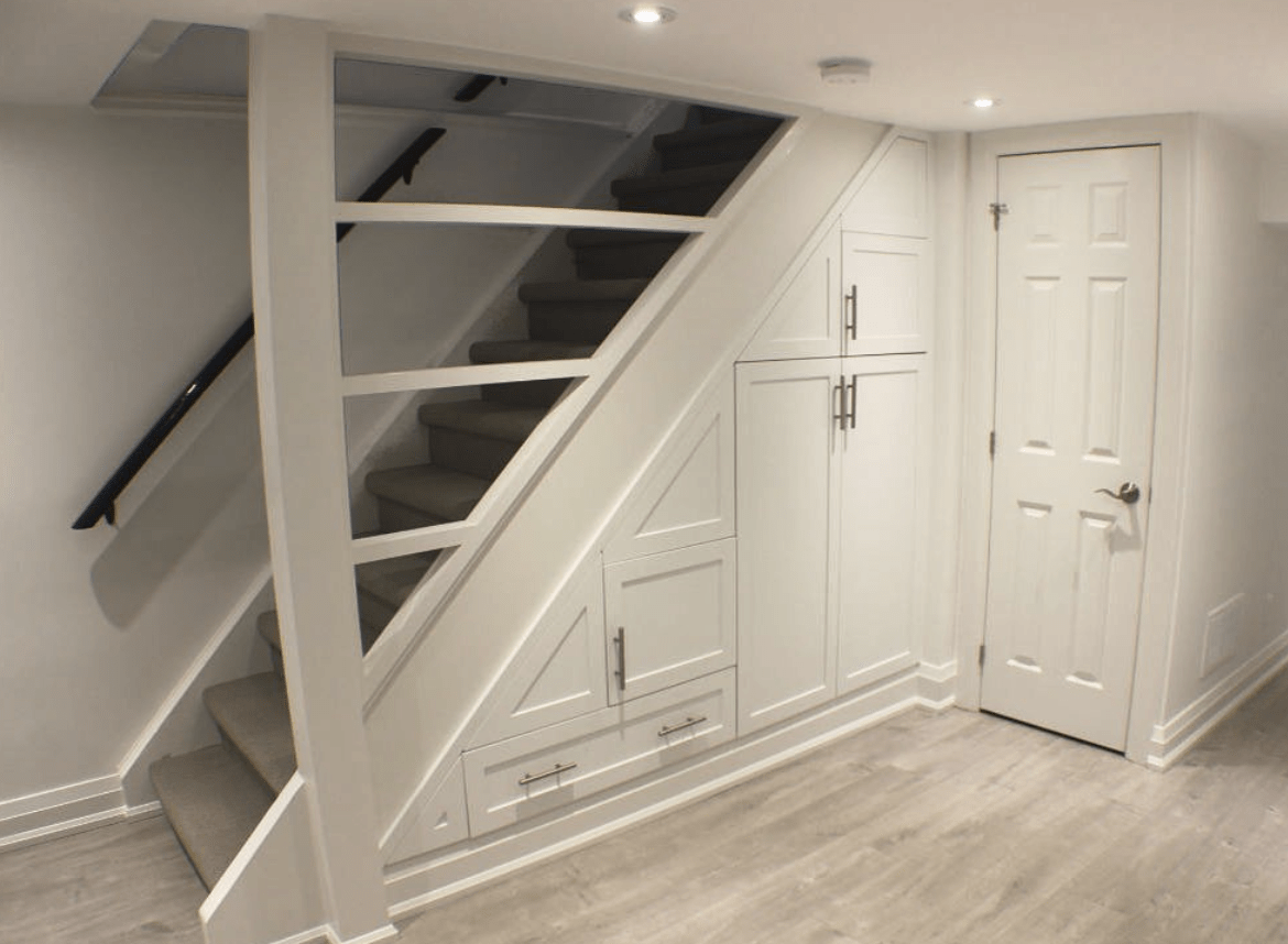 basement with under the stair cupboards built in