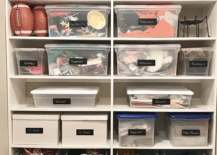 shelving unit in basement with plastic storage totes