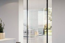 10 Examples of Pivot Doors Adding Drama and Style