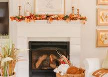 a mantel decked out in autumn decor